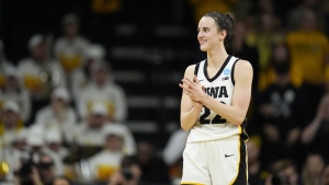 Caitlin Clark and her Iowa Hawkeyes defeated the West Virginia Mountaineers 64-54 last Monday. (Charlie Neibergall/AP Photo)