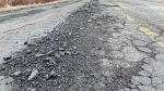 A heavily-damaged New Brunswick road is pictured. (Source: Derek Haggett/CTV News Atlantic)