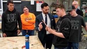 Education Minister Stephen Lecce speaks with students in Strathroy, Ont. following a funding announcement on March 27, 2024. (Marek Sutherland/CTV News London)