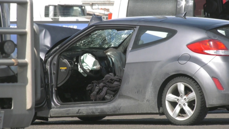 Calgary police investigate a crash in the area of 84 Street and 61 Avenue S.E. on Wednesday, March 27, 2024. 
