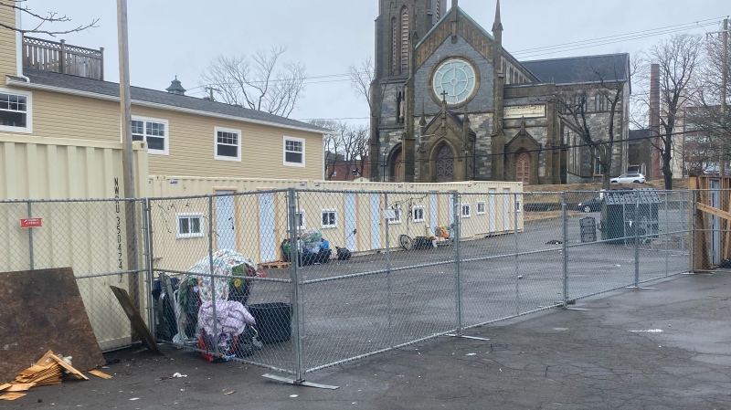 The site of a former tent encampment on Waterloo Street in Saint John has been cleaned up with 14 residents now living in container shelters. (Source: Avery MacRae/CTV News Atlantic)