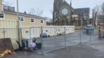 The site of a former tent encampment on Waterloo Street in Saint John, N.B., has been cleaned up with 14 residents now living in container shelters. (Avery MacRae/CTV Atlantic)
