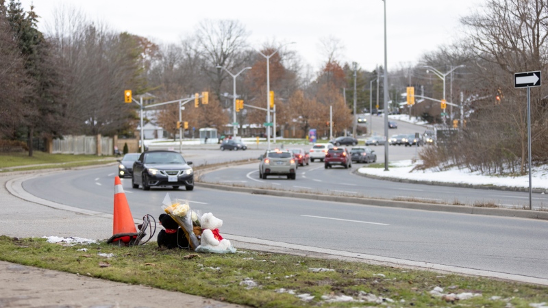 A memorial sits on Riverside Drive near Wonderland Road for victims in London, Ont., on Wednesday, Dec. 1st, 2021, following a fatal collision involving pedestrians Tuesday night. THE CANADIAN PRESS/Nicole Osborne