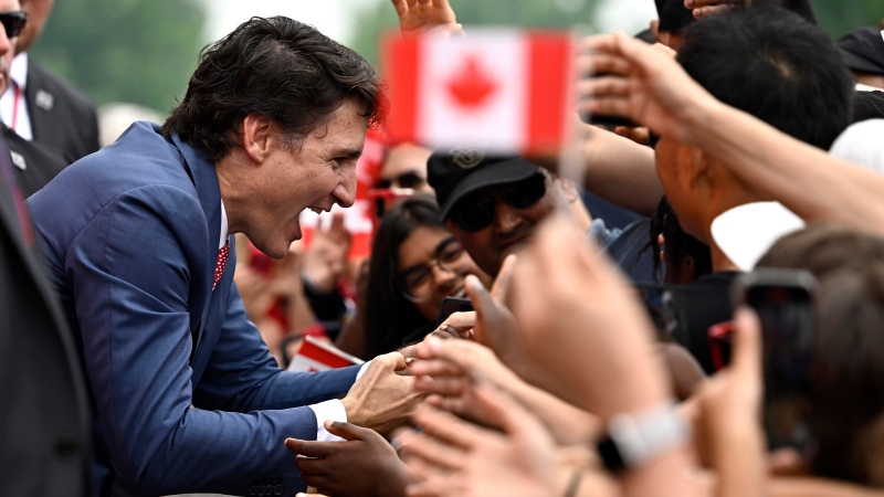 Prime Minister Justin Trudeau greets people in the crowd during the Canada Day noon show at LeBreton Flats in Ottawa, on Saturday, July 1, 2023. (THE CANADIAN PRESS/Justin Tang)