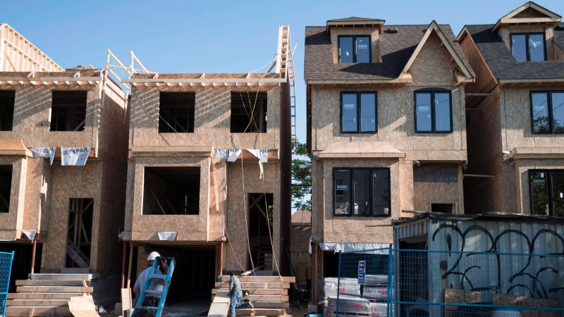 Houses under construction in Toronto on Friday, June 26, 2015. THE CANADIAN PRESS/Graeme Roy