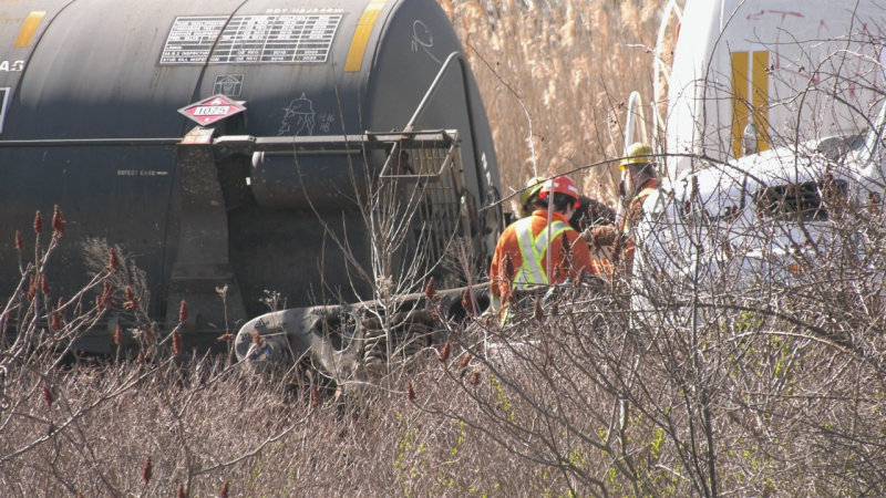 Crews work to clean up after a train derailment in Sarnia on March 28, 2024. (Gerry Dewan/CTV News London)