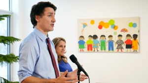 Deputy Prime Minister and Minister of Finance, Chrystia Freeland looks on as Prime Minister Justin Trudeau speaks at a press conference after meeting with families at a local child care centre in Ottawa, Wednesday, March 29, 2023. THE CANADIAN PRESS/Sean Kilpatrick