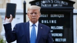 File photo of former U.S. President Donald Trump holding a Bible as he visits outside St. John's Church across Lafayette Park from the White House, June 1, 2020, in Washington (Patrick Semansky /AP Photo/ File)