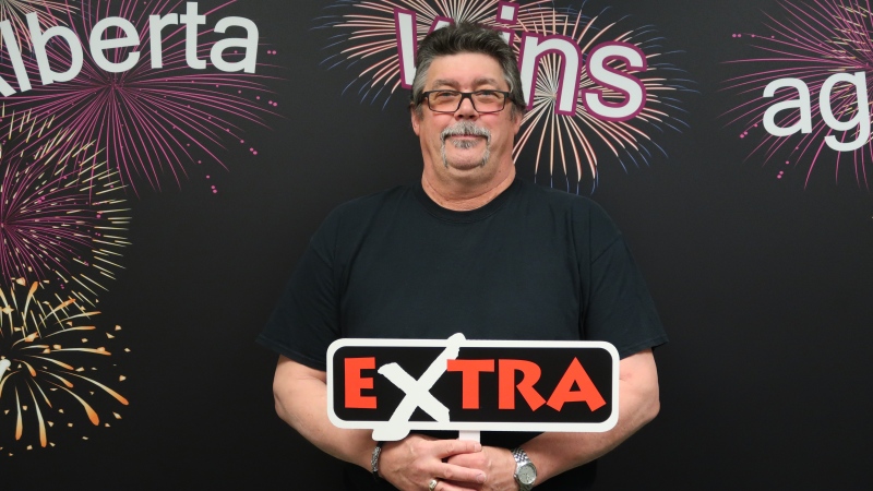 An Edmonton man, Kerry McIntosh, poses after winning $5 million in a Lotto 6/49 draw on March 28, 2024. (Courtesy: Western Canada Lottery Corporation)