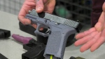 Police display a 3D-printed gun seized by EPS on March 7, 2024. (CTV News Edmonton)