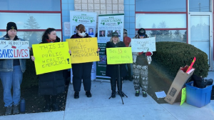 Protesters in front of MPP Doug Downey’s office in Barrie Ont., on March., 28, 2024. (CTV News/Mike Lang)