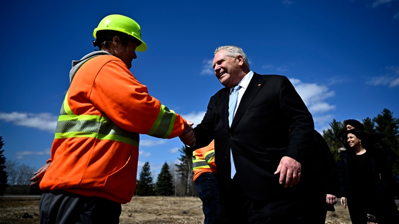 The Ontario budget's failure to directly address climate change represents a "gross abdication of responsibility" by the government, some critics argue, saying the province rapidly needs to do more to adapt to a changing climate. Ontario Premier Doug Ford greets workers prior to a funding announcement, in Ottawa, on Thursday, March 28, 2024. THE CANADIAN PRESS/Justin Tang
