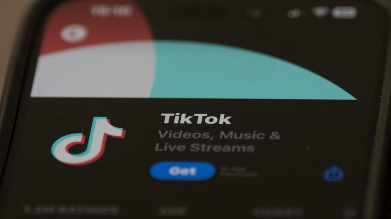 A new poll indicates 51 per cent of Canadians support banning the social media app TikTok, following a U.S. bill aiming to do just that over national security concerns. (Adrian Wyld / The Canadian Press)