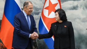In this photo released by Russian Foreign Ministry Press Service via their telegram channel, Russian Foreign Minister Sergey Lavrov, left, and North Korean Foreign Minister Choe Son Hui shake hands during their meeting in Pyongyang, North Korea, on Thursday, Oct. 19, 2023. (Russian Foreign Ministry Press Service telegram channel via AP)