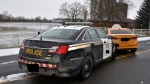 The marked OPP Ford Taurus located at the scene, oriented northeast behind the Hyundai in Aylmer, Ont. (Source: SIU)