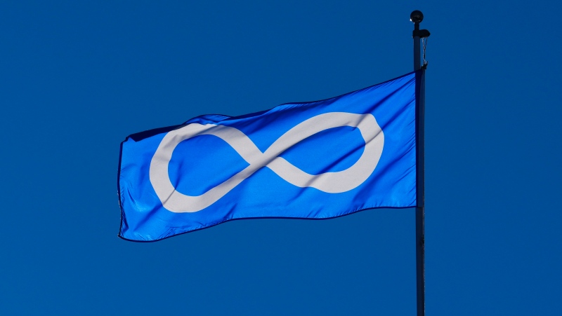 A Metis Nation flag flies in Ottawa on Tuesday, Jan. 31, 2023. (Sean Kilpatrick)