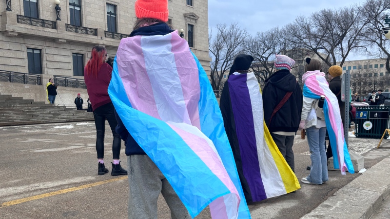 Dozens gather at the Manitoba Legislative Building on March 31, 2024 to bring attention to the Trans and Two-Spirit Day of Visibility (Daniel Halmarson/CTV News).