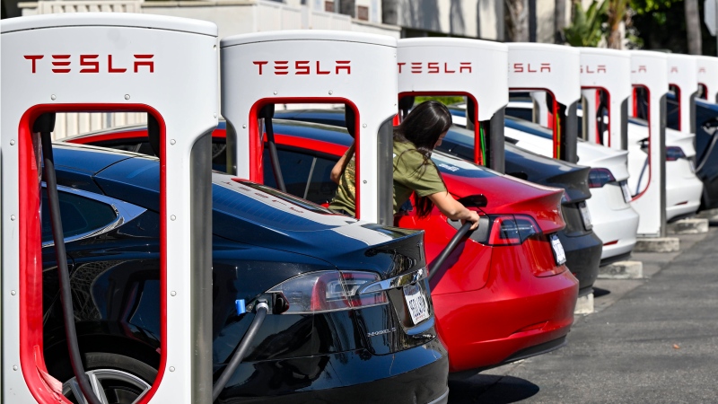 Drivers charge their Teslas in Santa Ana, Calif., on March 20, 2024. (Jeff Gritchen / The Orange County Register via AP) 