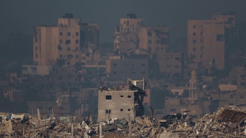 Destroyed buildings are seen in the Gaza Strip, as seen from southern Israel on Nov. 20, 2023. (AP Photo/Leo Correa, File)