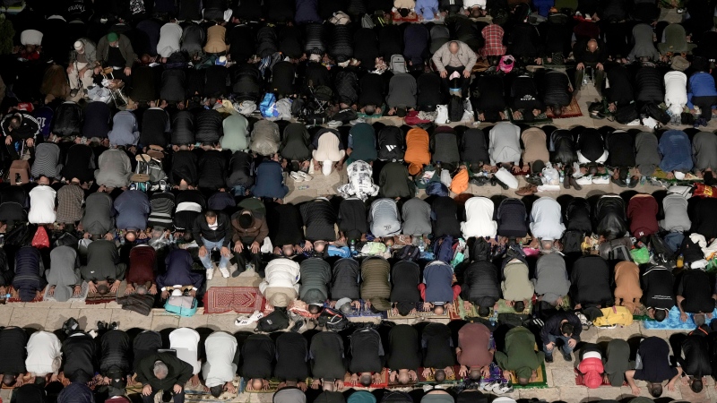 Muslims pray on Laylat al-Qadr, or night of power, that marks the last 10 days of the holy month of Ramadan, at the Al-Aqsa Mosque compound in Jerusalem's Old City, Friday, April 5, 2024. (AP Photo/Mahmoud Illean)