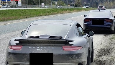 An Audi and Porsche that were allegedly caught going over 200 km/hr are seen in this image handed out by BC Highway Patrol. 
