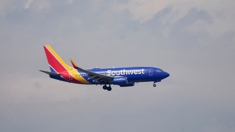FILE - A Southwest Airlines jetliner approaches at Denver International Airport Friday, May 26, 2023, in Denver. (AP Photo/David Zalubowski)