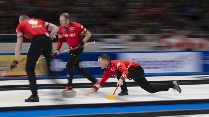Canadas's Skip Brad Gushue in action during the final game against Sweden at the Men's World Curling Championship, at the IWC Arena in Schaffhausen, Switzerland, April 7, 2024. (Christian Beutler/Keystone via AP)