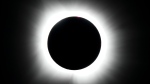 A total solar eclipse is seen from Arlington, Texas, Monday, April 8, 2024. (AP Photo/Julio Cortez)