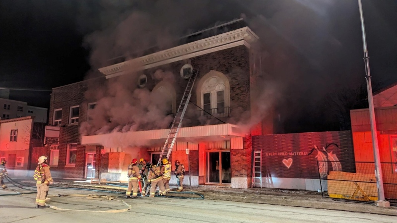 Firefighters in The Pas work to extinguish a fire at the historic Lido Theatre on April 8, 2024. (Manitoba RCMP)