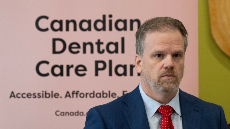 Minister of Health Mark Holland listens to a question following an announcement on dental care, Monday, December 11, 2023 in Ottawa. (THE CANADIAN PRESS/Adrian Wyld)