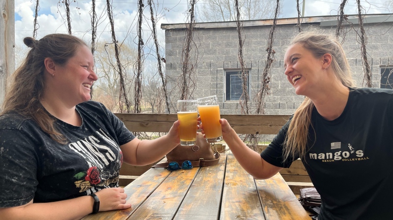 A pair of friends enjoy some pints at Four Fathers Brewing Co. in Cambridge on April 9, 2024. (Stefanie Davis/CTV Kitchener)
