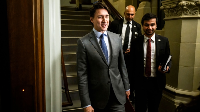 Prime Minister Justin Trudeau arrives for a meeting of the Liberal caucus in West Block on Parliament Hill in Ottawa, Wednesday, April 10, 2024. (Justin Tang / THE CANADIAN PRESS)