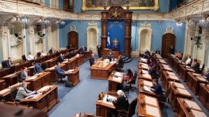 The Quebec legislature sits for question period as it comes to an end of the spring session, Friday, June 12, 2020 at the legislature in Quebec City. Quebec provincial police have launched an investigation after online threats were made against an elected official, spokesman Guy Lapointe said Sunday. In a tweet, Lapointe said many people had alerted police to threats made in a Facebook comment thread against a member of the Quebec legislature. (Jacques Boissinot, The Canadian Press)