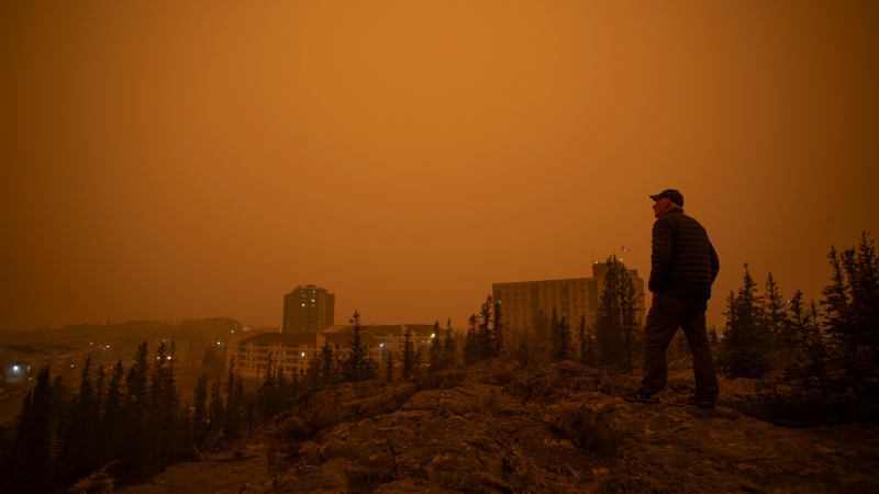 Heavy smoke from wildfires in northern Alberta and British Columbia fill the air at 9am Mountain Daylight Time in Yellowknife, Northwest Territories on Saturday, Sept. 23, 2023. THE CANADIAN PRESS/Bill Braden 