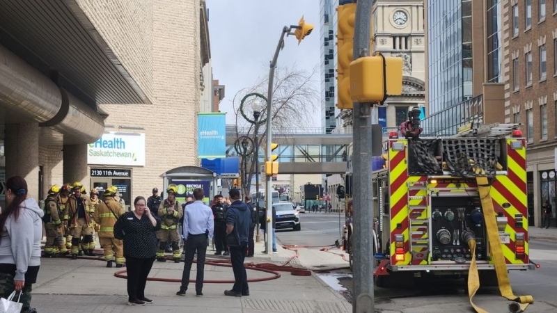 Regina fire crews on 11th Avenue as they respond to an emergency at the Cornwall Centre. (Submitted)
