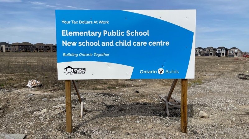 A sign advertising the future home of an elementary school and child care centre in Woodstock, Ont. is seen on April 10, 2024. (Duane Oud/CTV News London) 