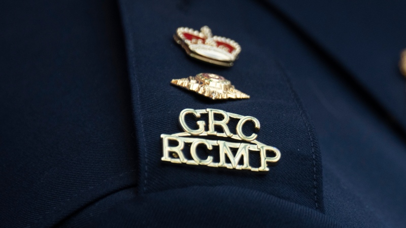 The RCMP logo is seen on the shoulder of a superintendent during a news conference, Saturday, June 24, 2023 in St. John's, N.L. THE CANADIAN PRESS/Adrian Wyld