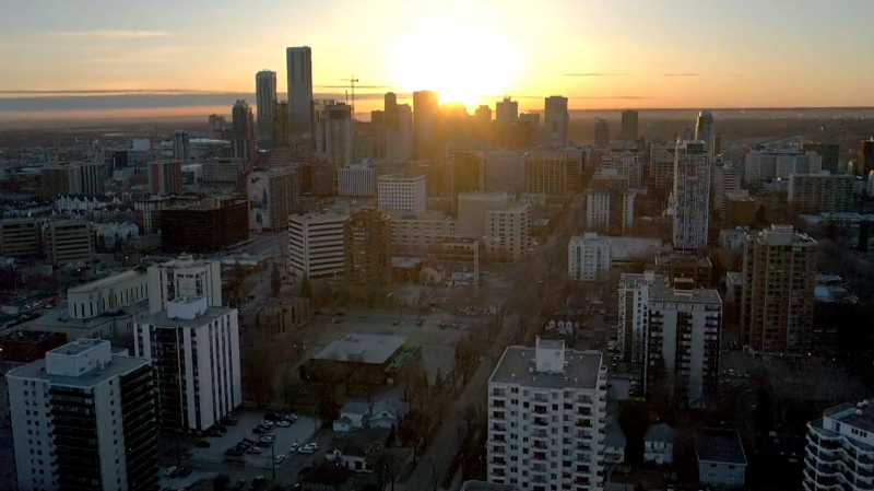 The sun rises over downtown Edmonton on April 11, 2024. (Cam Wiebe / CTV News Edmonton) 