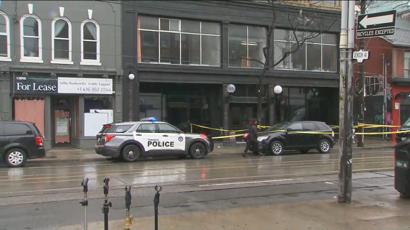Police respond to a triple shooting at Queen and Portland streets in downtown Toronto Thursday April 11, 2024.