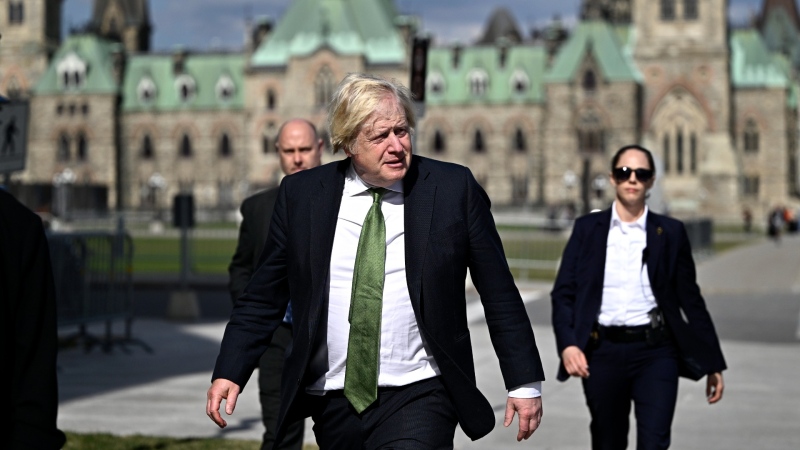 Former prime minister of the United Kingdom Boris Johnson makes his way towards West Block on Parliament Hill in Ottawa, April 10, 2024. THE CANADIAN PRESS/Justin Tang