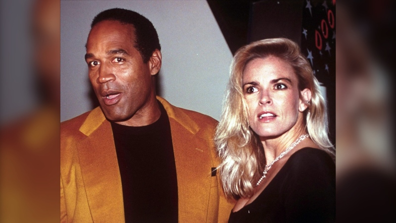 FILE - This Oct. 19, 1993 file photo shows O.J. Simpson and his wife, Nicole Brown Simpson, at the opening of the Harley-Davidson Cafe in New York. (AP Photo / Paul Hurschmann, File)