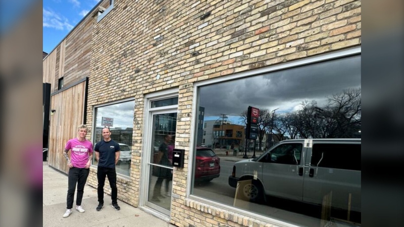 Jenna Priestner and Cory Thomas stand outside of their new venue Sidestage, which they are hoping to open in the fall. April 11, 2024. (Devon McKendrick/CTV News Winnipeg)