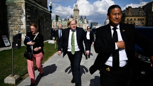 Former Prime Minister of the United Kingdom Boris Johnson makes his way towards West Block on Parliament Hill in Ottawa, on Wednesday, April 10, 2024. THE CANADIAN PRESS/Justin Tang