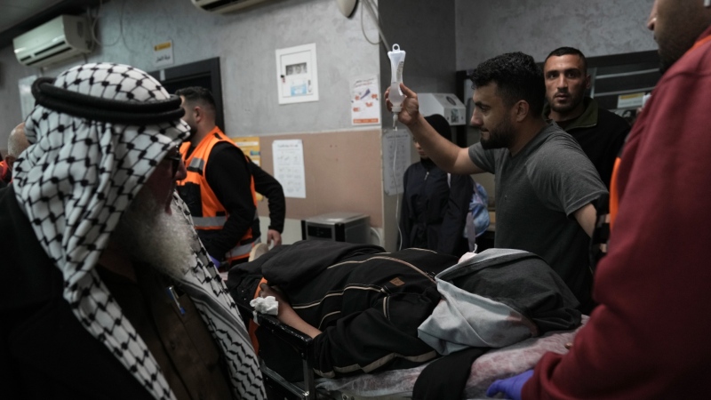 A Palestinian woman wounded in a settler rampage arrives at the Palestine Medical Complex in the West Bank city of Ramallah, April 12, 2024. (AP Photo/Nasser Nasser)