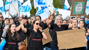 Union members of the Federation interprofessionnelle de la sante du Quebec (FIQ) march to the National Assembly to demonstrate, in Quebec City, Monday, Oct. 2, 2023. (Jacques Boissinot, The Canadian Press)