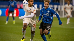 CF Montreal's Bryce Duke (10) chases after FC Cincinnati's Ian Murphy During first half MLS soccer action in Montreal, Saturday, April 13, 2024. (Peter McCabe, The Canadian Press)