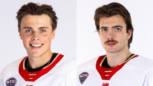 From left to right, University of Denver defenceman Boston Buckberger and goaltender Paxton Geisel. (Courtesy: denverpioneers.com)