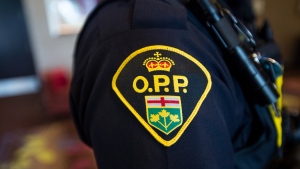 An Ontario Provincial Police crest is displayed on the arm of an officer during a press conference in Vaughan, Ont., on Thursday, June 20, 2019. (File photo/Andrew Lahodynskyj/The Canadian Press)