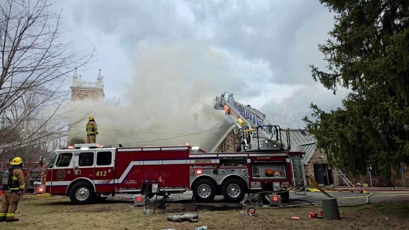 A fire at the St. James Church in Hudson, Que. has caused serious damage to the historic structure that was built in 1842. (Emanuel Lapointe)