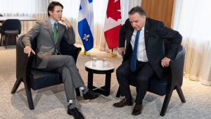 Prime Minister Justin Trudeau, and Quebec Premier Francois Legault sit down for a bilateral meeting in Montreal, Friday March 15, 2024. (Christinne Muschi, The Canadian Press)